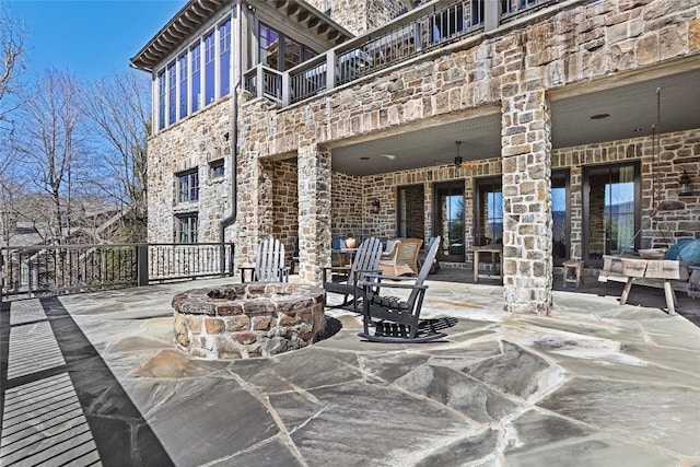196 Stove Pipe Ct, Cashiers, NC 28717 - view of patio featuring an outdoor fire pit and a balcony