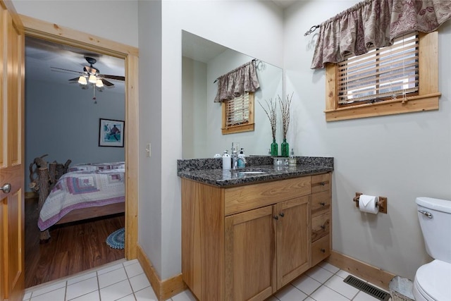 8 Par Path, Cashiers, NC 28717 - ensuite bathroom with vanity, tile patterned flooring, and ceiling fan