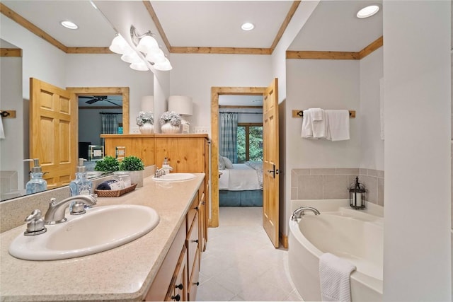 ensuite bathroom with double vanity, a sink, a bath, and ensuite bathroom