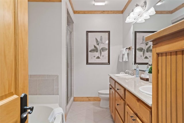 bathroom featuring tile patterned floors, toilet, an enclosed shower, a sink, and a bath