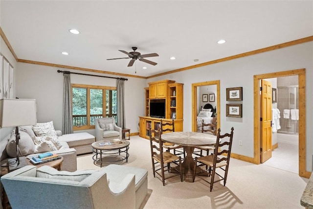 living room featuring ornamental molding, recessed lighting, light carpet, and baseboards