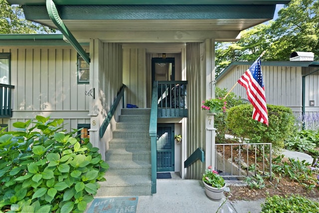 28 Toxaway Pt Unit 7, Lake Toxaway, NC 28747 - doorway to property with board and batten siding