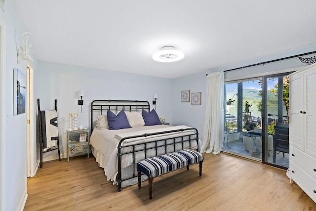 28 Toxaway Pt Unit 7, Lake Toxaway, NC 28747 - bedroom with access to outside and light wood-style floors