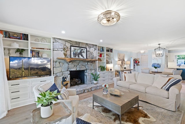 28 Toxaway Pt Unit 7, Lake Toxaway, NC 28747 - living area featuring a stone fireplace, a chandelier, and wood finished floors