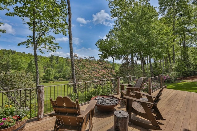 547 Burl Ln, Cashiers, NC 28717 - wooden deck with a forest view