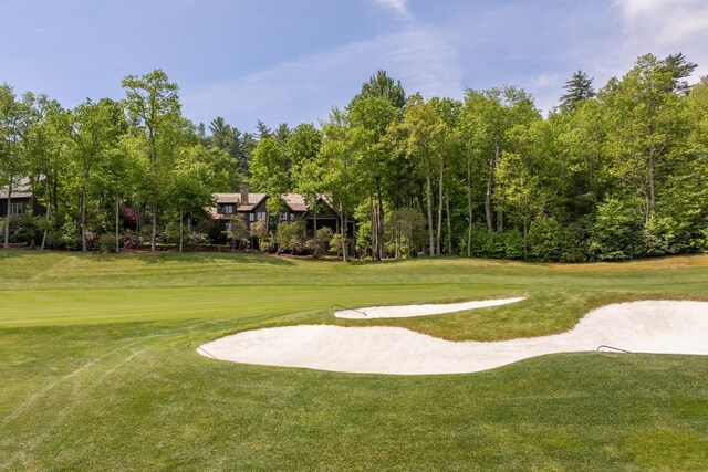 547 Burl Ln, Cashiers, NC 28717 - surrounding community with a yard and view of golf course