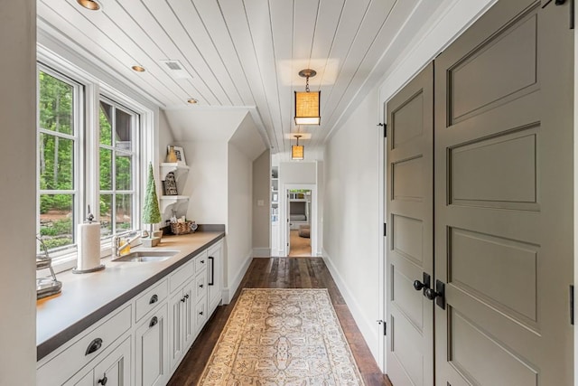 547 Burl Ln, Cashiers, NC 28717 - entrance foyer with dark wood-style floors, healthy amount of natural light, and baseboards