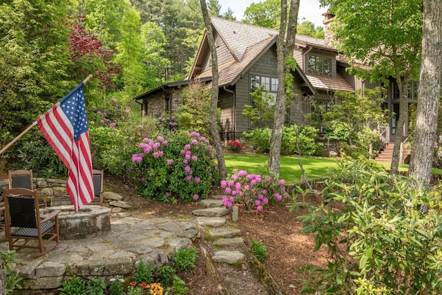 547 Burl Ln, Cashiers, NC 28717 - view of green lawn with a patio area and a fire pit