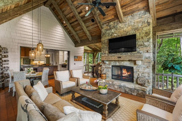 547 Burl Ln, Cashiers, NC 28717 - living room with hardwood / wood-style flooring, wood ceiling with exposed beams, high vaulted ceiling, ceiling fan, and a fireplace