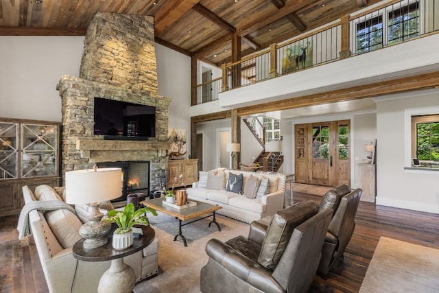 547 Burl Ln, Cashiers, NC 28717 - living area featuring wood ceiling with exposed beams, wood-type flooring, a fireplace, stairway, and baseboards