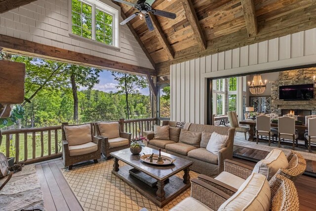 547 Burl Ln, Cashiers, NC 28717 - sunroom / solarium with healthy amount of natural light and a chandelier