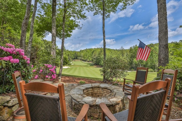 547 Burl Ln, Cashiers, NC 28717 - view of patio featuring a fire pit and view of golf course
