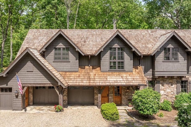 547 Burl Ln, Cashiers, NC 28717 - view of front of property featuring stone siding, driveway, and covered porch