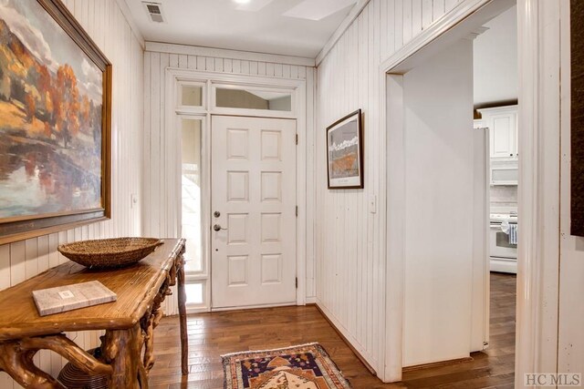 entrance foyer featuring dark wood-type flooring