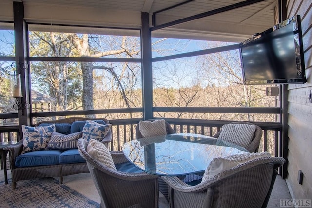 sunroom / solarium with a wealth of natural light