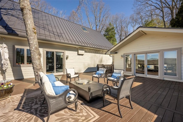 wooden deck featuring an outdoor hangout area