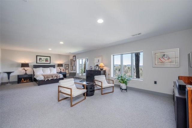 living room featuring visible vents, recessed lighting, baseboards, and carpet floors