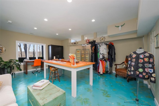 dining area with recessed lighting, baseboards, and finished concrete flooring