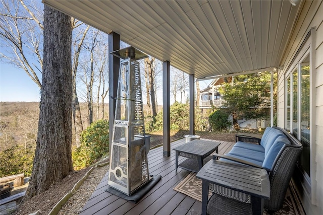 deck featuring outdoor lounge area