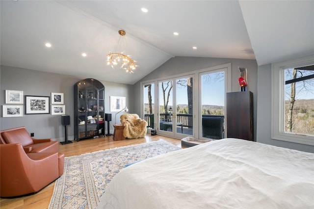 bedroom with access to exterior, recessed lighting, light wood-style floors, lofted ceiling, and a chandelier