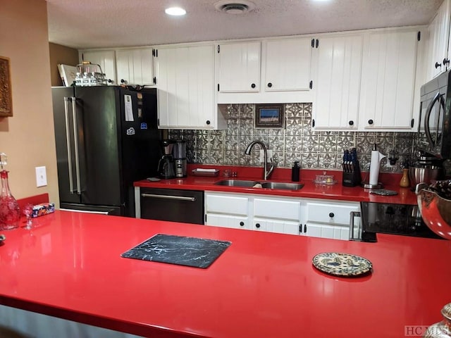 369 Meadow Way Unit 1713, Sapphire, NC 28774 - kitchen with high end refrigerator, black dishwasher, tasteful backsplash, white cabinets, and a textured ceiling