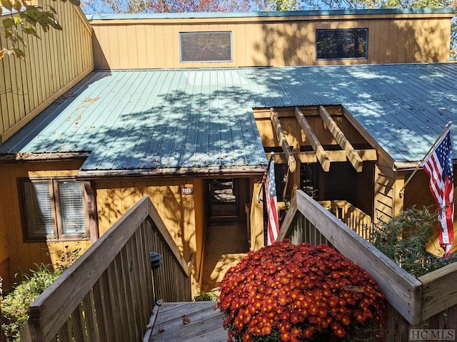 369 Meadow Way Unit 1713, Sapphire, NC 28774 - view of side of home featuring a metal roof and a wooden deck