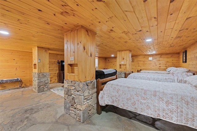 229 Yellow Bird Branch Rd, Sylva, NC 28779 - bedroom with wooden ceiling, wood walls, stone finish floors, and recessed lighting