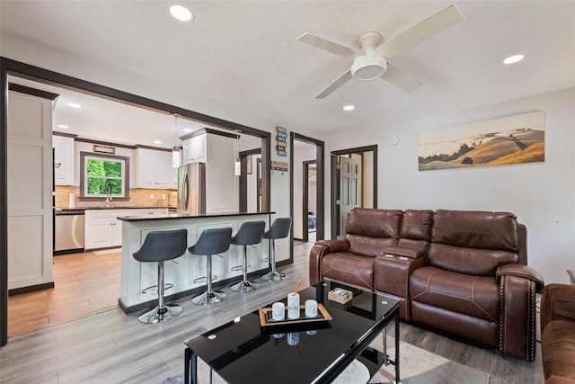 229 Yellow Bird Branch Rd, Sylva, NC 28779 - living room featuring light wood-style floors, recessed lighting, and a ceiling fan