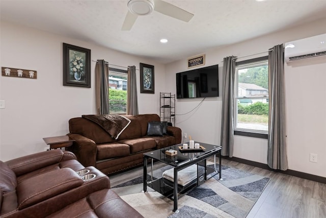 229 Yellow Bird Branch Rd, Sylva, NC 28779 - living area featuring ceiling fan, an AC wall unit, light wood-style floors, and recessed lighting