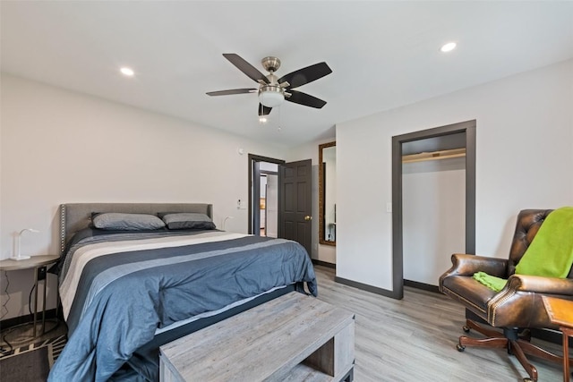229 Yellow Bird Branch Rd, Sylva, NC 28779 - bedroom featuring light wood-style floors, a ceiling fan, and recessed lighting