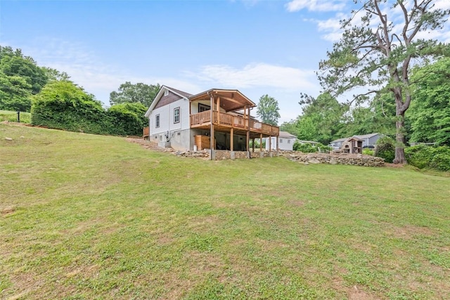 229 Yellow Bird Branch Rd, Sylva, NC 28779 - back of house featuring a deck and a yard