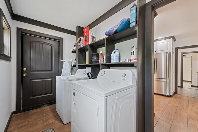229 Yellow Bird Branch Rd, Sylva, NC 28779 - laundry area with washer and dryer and wood finished floors