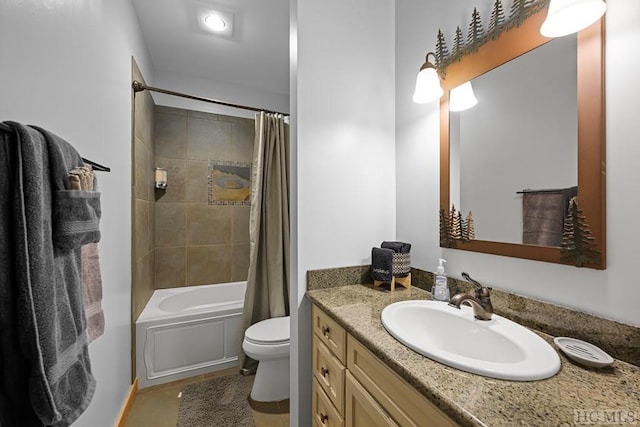 full bathroom with shower / tub combo, vanity, and toilet