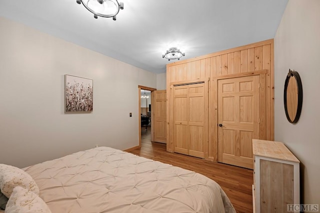 bedroom featuring light hardwood / wood-style floors and a closet