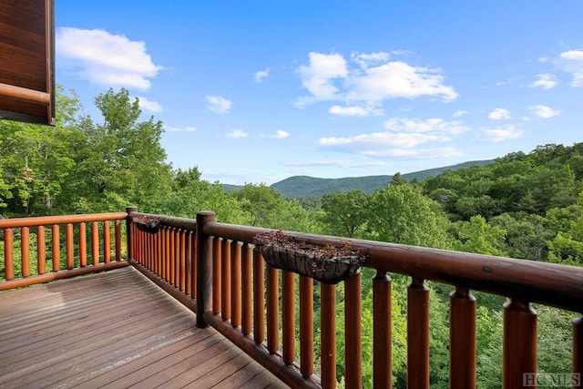 wooden terrace with a mountain view