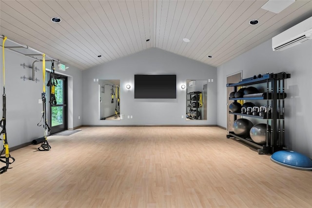 workout area with baseboards, a wall unit AC, wood finished floors, vaulted ceiling, and wood ceiling