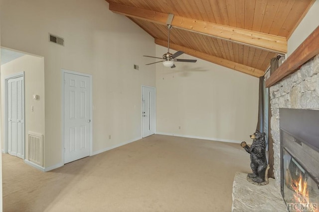 unfurnished living room with beam ceiling, wood ceiling, high vaulted ceiling, light carpet, and a fireplace