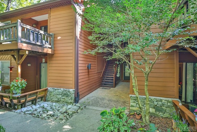 view of property exterior with a balcony