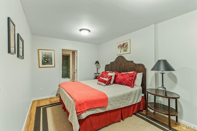 bedroom featuring wood-type flooring