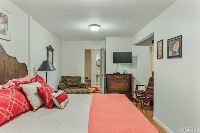 bedroom featuring hardwood / wood-style floors