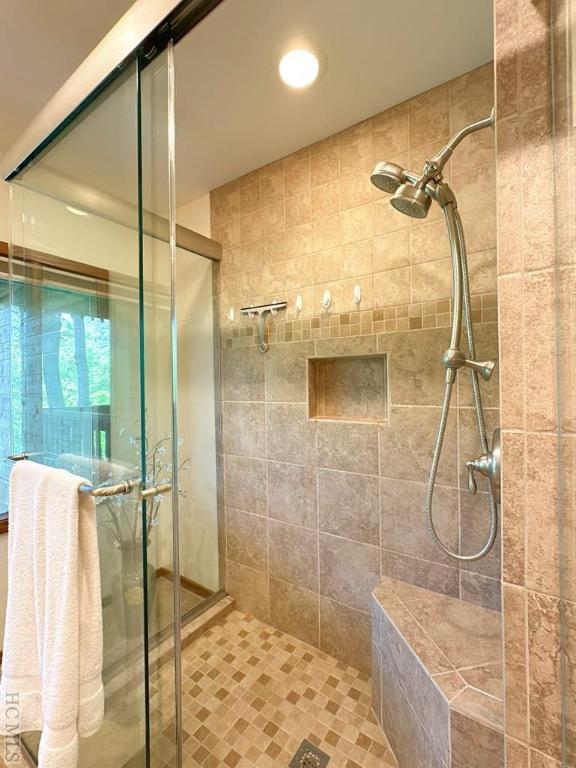 bathroom with walk in shower