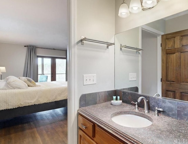 bathroom featuring vanity and hardwood / wood-style floors