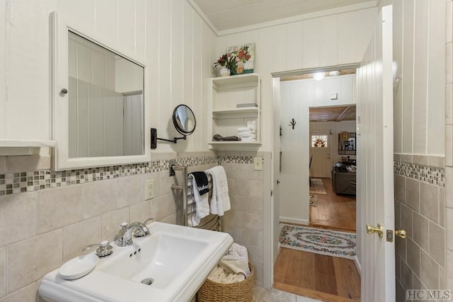 48 Holt Knob Rd, Highlands, NC 28741 - bathroom featuring tile walls, wood finished floors, and ornamental molding