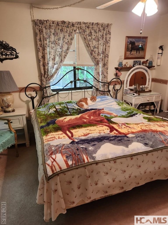 bedroom featuring carpet flooring