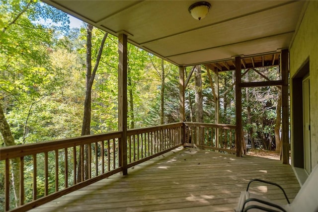 61 Indian Falls Way, Lake Toxaway, NC 28747 - wooden terrace featuring a view of trees