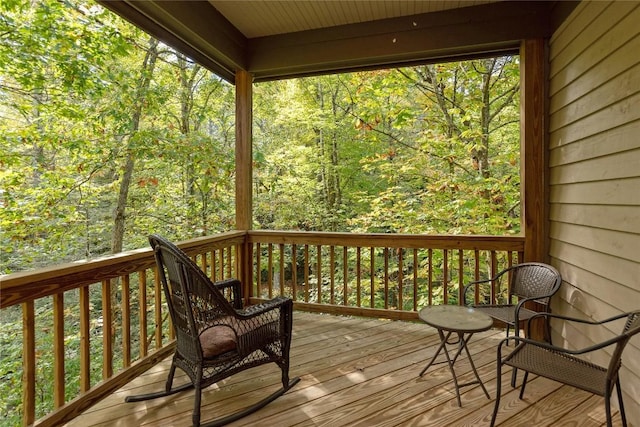 61 Indian Falls Way, Lake Toxaway, NC 28747 - wooden deck with a forest view