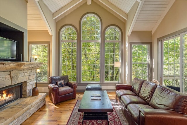 61 Indian Falls Way, Lake Toxaway, NC 28747 - sunroom with wood-type flooring, plenty of natural light, beamed ceiling, and high vaulted ceiling