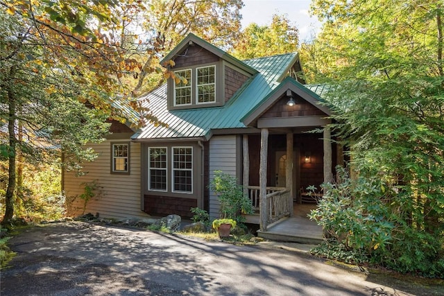61 Indian Falls Way, Lake Toxaway, NC 28747 - craftsman-style house featuring a metal roof and a standing seam roof