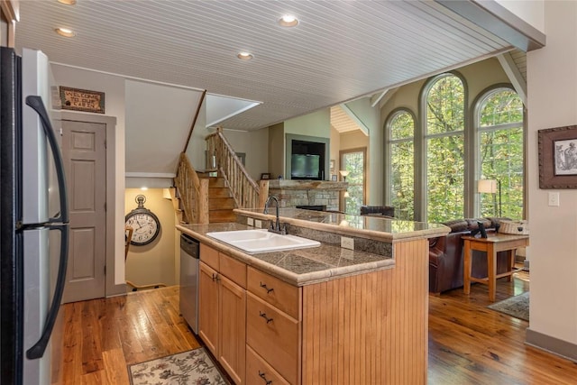 61 Indian Falls Way, Lake Toxaway, NC 28747 - kitchen with appliances with stainless steel finishes, light wood-type flooring, tile counters, recessed lighting, and wooden ceiling