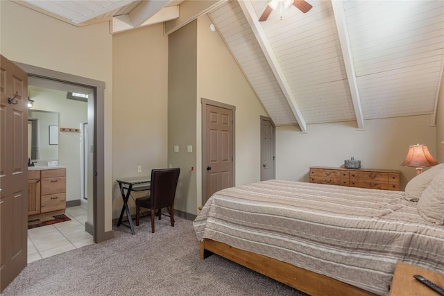 61 Indian Falls Way, Lake Toxaway, NC 28747 - bedroom featuring light carpet, ensuite bathroom, light tile patterned floors, a wood ceiling with exposed beams, and ceiling fan